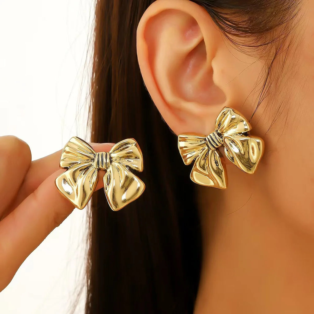 Boucles d'Oreilles Clou Nœud Métal Doré — Acier Inoxydable, Cadeau Femme & Fille