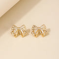 Boucles d'Oreilles Clou Nœud Métal Doré — Acier Inoxydable, Cadeau Femme & Fille