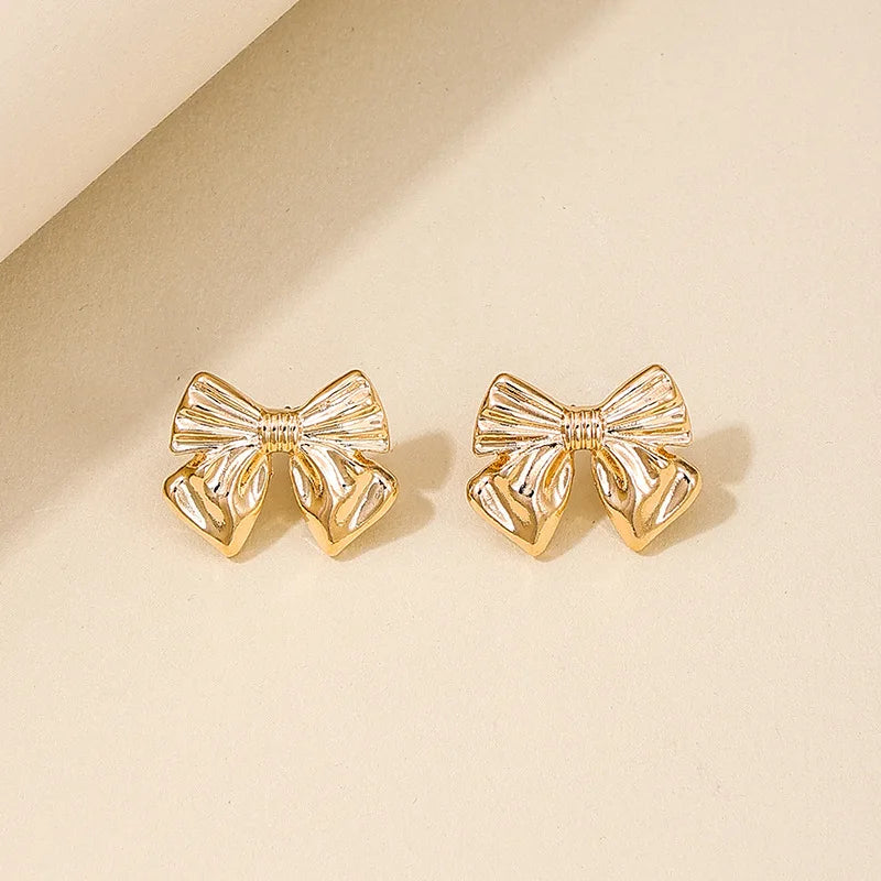 Boucles d'Oreilles Clou Nœud Métal Doré — Acier Inoxydable, Cadeau Femme & Fille